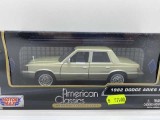 Macheta metal Dodge Aries K auriu 1:24