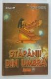 STAPANII DIN UMBRA de PAVEL CORUT , 2008