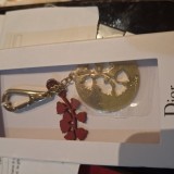 Breloc Dior, Auriu