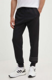 Cumpara ieftin Adidas Originals pantaloni de trening culoarea negru, cu imprimeu IS2812