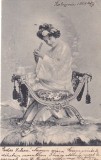 Femeie in costum traditional asiatic asezata pe un scaun ornamental (circulata