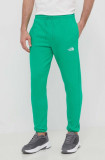 Cumpara ieftin The North Face pantaloni de trening culoarea verde, neted, NF0A7ZJBPO81