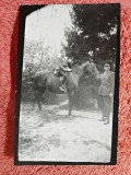 Fotografie tip carte postala, femeie pe cal si militar, perioada interbelica