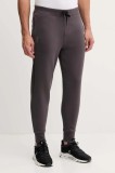 On pantaloni de antrenament Focus Tech culoarea violet, uni, 1MF30320569
