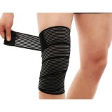 Cumpara ieftin Orteza elastica pentru picior sau mana, cu prindere tip arici, 7.5 x 180 cm, nailon, negru