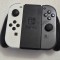 Set 2 x Controller Joy-Con NINTENDO Switch, alb-gri + suport controller