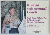O VIATA SUB SEMNUL CRUCII , INALT PREA - SFINTIA SA ARHIEPISCOPUL DIRAYR MARCHIDIAN in dialog cu VARTAN ARACHELIAN , 2000 *DEDICATIE