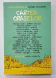 CARTEA ORASELOR , volum coordonat de ANDREEA RASUCEANU , desene de MIHAIL COSULETU , 2021