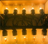 Ghirlanda Luminoasa 5m cu 10 LED Flacara, Interconectabila, IP44, Portocalie, Cablu Negru, Decor Craciun