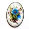 Magnet cu flori albastre, rosu burgund si floare violet, magnet oval pe lemn 40426