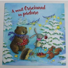 A VENIT CRACIUNUL IN PADURE , text de SUSANNE LUTKE , ilustratii de ELENI LIVANIOS , 2021