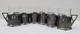 Sase suporturi WMF cu pahare din sticla, cca. 1906