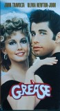Grease , John Travolta și Olivia Newton John , film pe casetă video