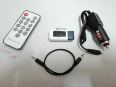 FM Transmitter , Hands Free , Iphone 3GS , 4 , 4S , Ipad , Ipod foto