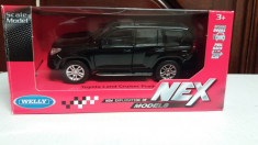 macheta toyota land cruiser prado - welly, 1/32, noua. foto