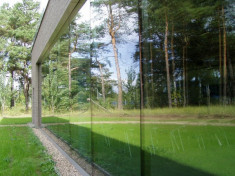 Folie protectie solara reflexiva geamuri termopane pentru casa,cladiri , sedii , latime 0.75m, neagra 20% - FGT78599 foto