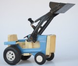 Cumpara ieftin Jucarie veche tabla, tractor incarcator frontal MUKPO - Bulgaria, 1:64