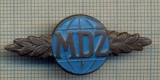 Y 513 INSIGNA - ,,MDZ&quot; - ZIUA INTERNATIONALA A FEMEII - PENTRU COLECTIONARI