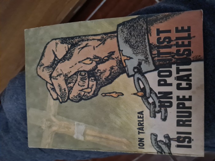 Un politist isi rupe catusele-Ion Tarlea