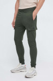 Cumpara ieftin EA7 Emporio Armani pantaloni de trening din bumbac culoarea verde, neted