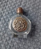 Sticluta cu eticheta placata cu argint