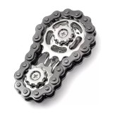 Cumpara ieftin Jucarie antistres argintie 6 x 3.5 cm, fidget metalic cu lant tip bicicleta si mecanism rotativ, accesoriu compact pentru dexteritate si relaxare