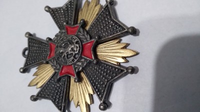 MEDALIE VECHE RUPTA foto