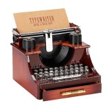 Cumpara ieftin Cutie muzicala tip masina de scris, plastic, 14&times;15&times;13 cm, maro