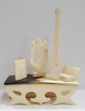 Ansamblu sculptat in os cu tema muzicala, Secol 20