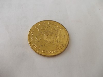 Jeton vechi cien pesos foto