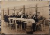 Musterii inchinand un pahar la o masa, Romania 1935// fotografie