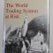 THE WORLD TRADING SYSTEM AT RISK by JAGDISH BHAGWATI , 1991