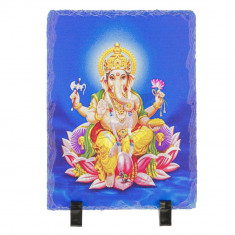 Placheta ( placa ) cu Ganesh pe floare de lotus foto