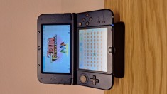 New Nintendo 3DS XL &ndash; Modat + 440 Jocuri: Mario, Pok&eacute;mon, Zelda, etc.