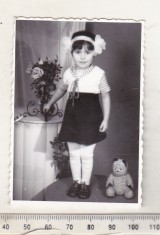 bnk foto Copii cu jucarii - fetita cu ursulet de plus