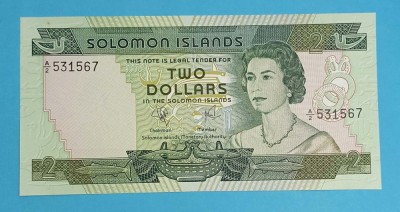 Bancnotă Insulele Solomon (pick 5) 2 Dollars 1977 UNC serie: A/2 531567 foto