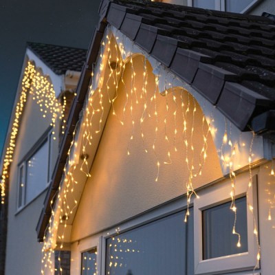 Instalatie craciun tip franjuri/turturi, 8 jocuri de lumini, interconectabila, 4 m, 120 led-uri, prelungitor 1.5 m, fir transparent, alb cald foto