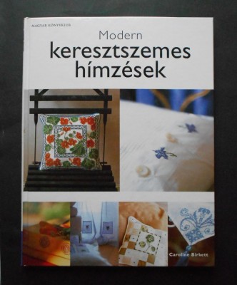 Cusatura cruce, broderie moderna foto