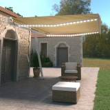 vidaXL Copertină automată cu LED &amp; senzor v&acirc;nt, galben&amp;alb, 500x350 cm