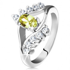 Inel lucios de culoare argintie, linie netedă şi cu zirconii, zirconiu oval verde deschis - Marime inel: 58