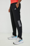 Cumpara ieftin Adidas Performance pantaloni de alergare Own the Run barbati, culoarea negru, cu imprimeu
