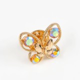 Brosa martisor fluture auriu cu pietre multicolore