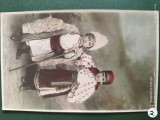 carte postala deosebita , interesanta ,copii in costum traditional , baiatul , cu cojoc pana la pamant .foto color