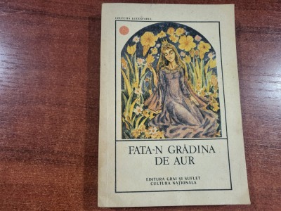 Fata-n gradina de aur foto