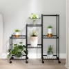 Gossi suport pentru flori cu roti, 83x25x83,5 cm, negru, fier