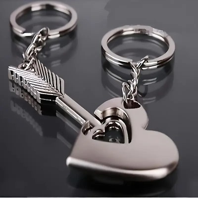 Set 2 brelocuri cu inima si sageata lui Cupidon , model cuplu care se completeaza foto