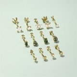 Cumpara ieftin Imaginea prezinta o colectie de bijuterii pentru piercing, mai exact modele de tip banana (curved barbell), realizate din argint placat cu aur galben