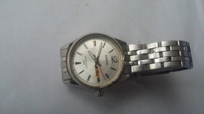 CEAS CASIO WATER RESIST 50 M , DE DAMA ,NU STIU DACA FUNCTIONEAZA . foto