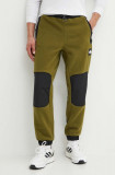 The North Face pantaloni de trening M Fleeski Y2K Pant culoarea verde, cu model, NF0A879MPIB1