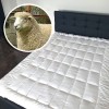 Protecție de pat 100% naturală umplută cu l&acirc;nă - 140x200